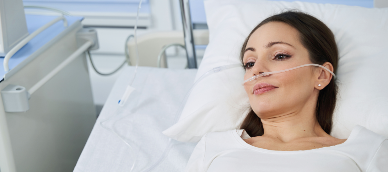 Patient with nasal cannula in hospital